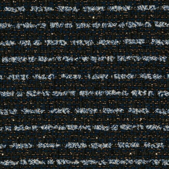 Tweed rayé bleu marine avec touches dorées et cuivrées. Aspect sophistiqué.
