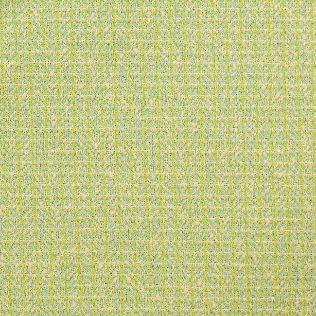 Tweed pastel dans des tons vert et jaune pâle. Effet moucheté délicat.