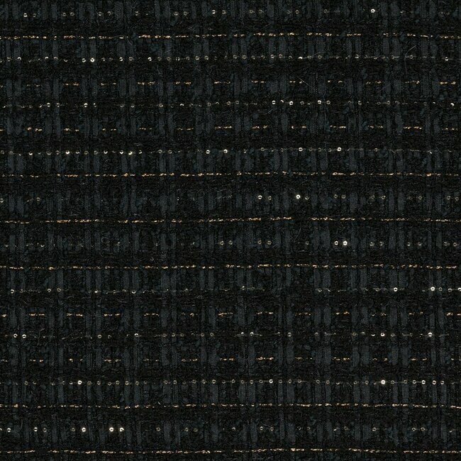 Tweed noir avec tissage serré et reflets métalliques subtils. Surface uniforme.