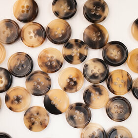 Bouton en corne tacheté 50% 4 trous 15mm 