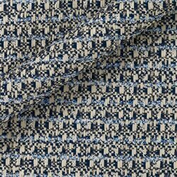 Tweed mosaïque avec tons blancs, crème et bleu marine. Texture graphique.