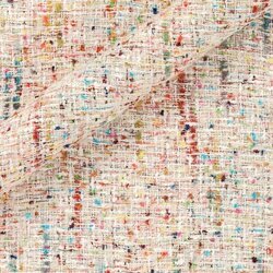 Tweed blanc épais avec touches multicolores et reflets métalliques. Texture luxueuse.