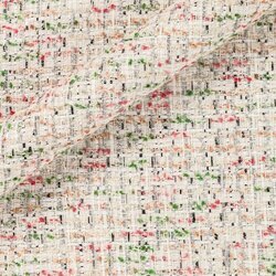 Tweed blanc neige parsemé de fils argentés. Finition sophistiquée et lumineuse.