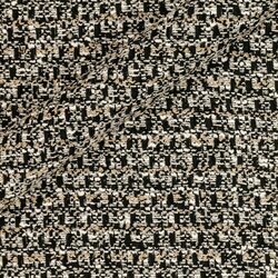Tweed contrasté noir et blanc avec tissage graphique et reflets métallisés discrets.