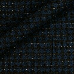 Tweed bleu profond avec tissage dense et touches d'alpaga pour plus de douceur.