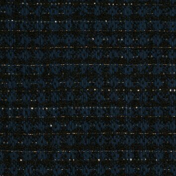 Tweed bleu profond avec tissage dense et touches d'alpaga pour plus de douceur.