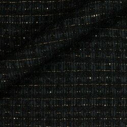 Tweed noir avec tissage serré et reflets métalliques subtils. Surface uniforme.